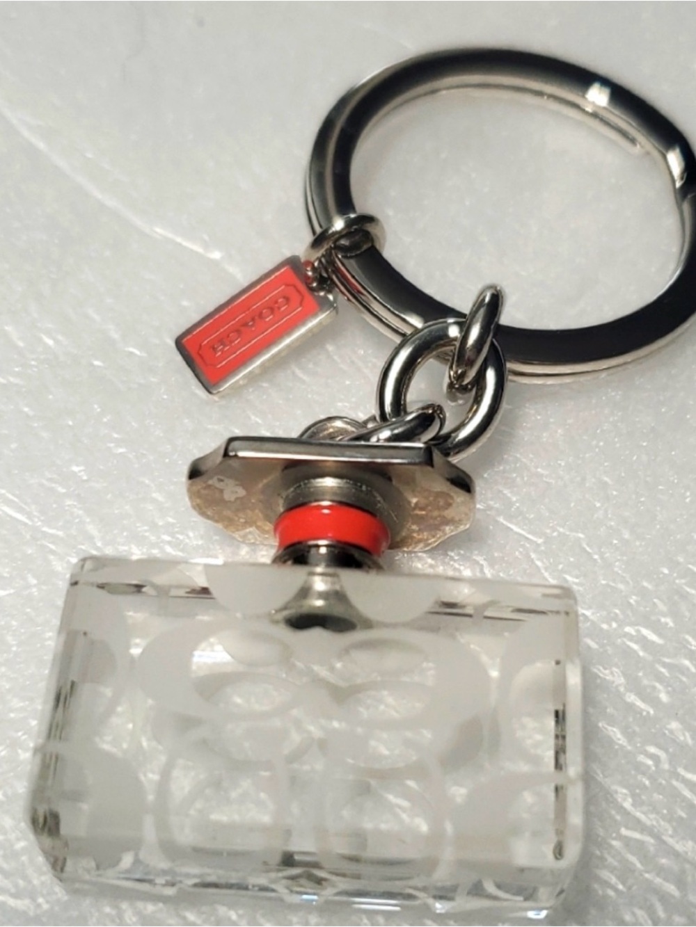 Coach Clear Crystal and Silver Keyring with Red Accent
